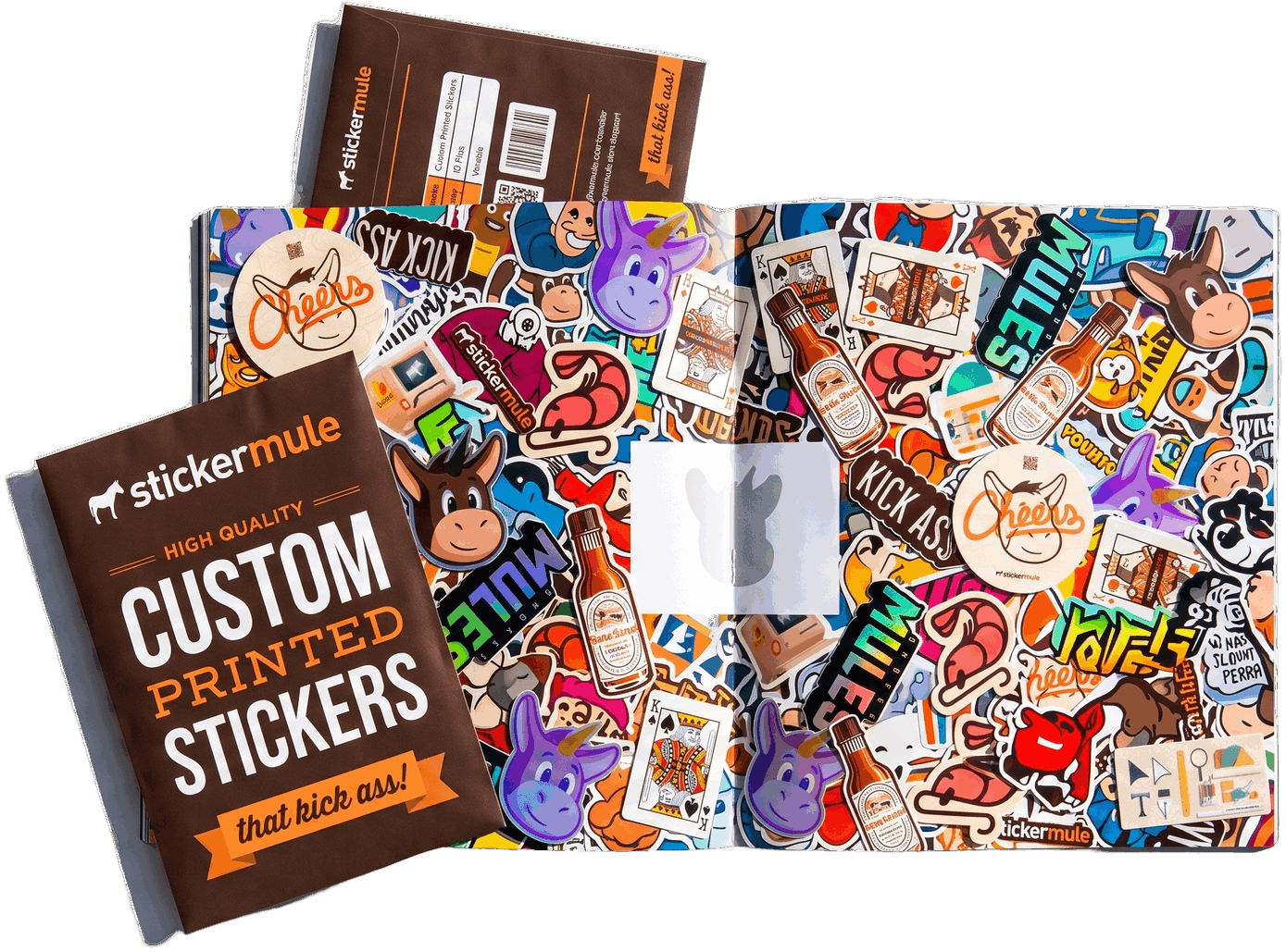 Open sticker album covered in die-cut stickers, with sealed sticker packs
